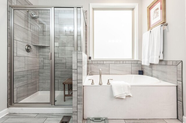 2044 Albatross Way, Gallatin, TN 37066 - bathroom featuring a shower stall and a bath