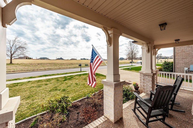 2044 Albatross Way, Gallatin, TN 37066 - covered porch featuring a lawn