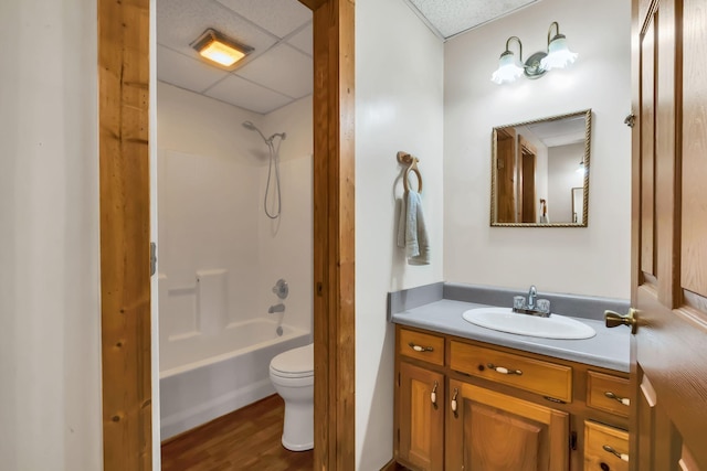 1010 Scott Rd, Bethpage, TN 37022 - full bathroom with vanity, bathing tub / shower combination, wood finished floors, and a drop ceiling