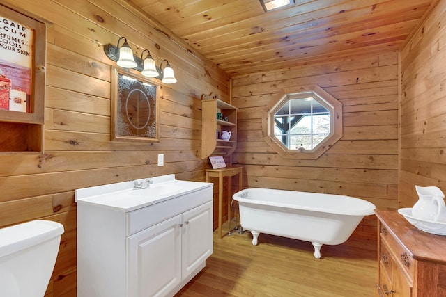 1010 Scott Rd, Bethpage, TN 37022 - full bath featuring vanity, a soaking tub, wooden walls, wood finished floors, and wood ceiling