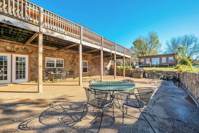 1010 Scott Rd, Bethpage, TN 37022 - view of patio / terrace featuring a wooden deck, stairs, and outdoor dining space