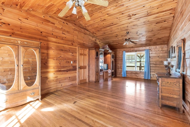 1010 Scott Rd, Bethpage, TN 37022 - unfurnished bedroom featuring lofted ceiling, wooden walls, light wood-style floors, and wooden ceiling