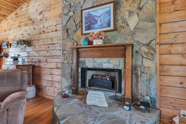 1010 Scott Rd, Bethpage, TN 37022 - living room with wood finished floors, wooden ceiling, lofted ceiling, a fireplace, and wooden walls