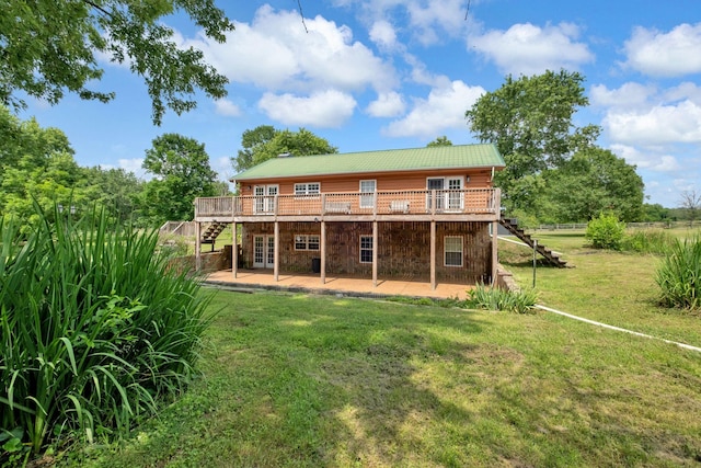 1010 Scott Rd, Bethpage, TN 37022 - rear view of house with stairway, a deck, a lawn, and french doors