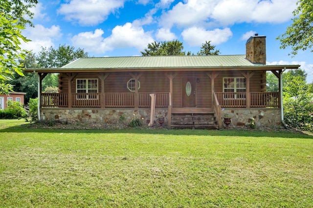 1010 Scott Rd, Bethpage, TN 37022 - log home featuring a chimney, log siding, covered porch, and a front yard