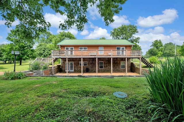 1010 Scott Rd, Bethpage, TN 37022 - rear view of property with stone siding, stairs, a lawn, and a deck