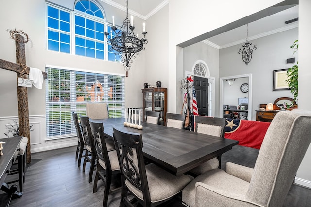 3134 Friars Bridge Pass, Franklin, TN 37064 - dining space with a chandelier, crown molding, dark wood finished floors, and a towering ceiling