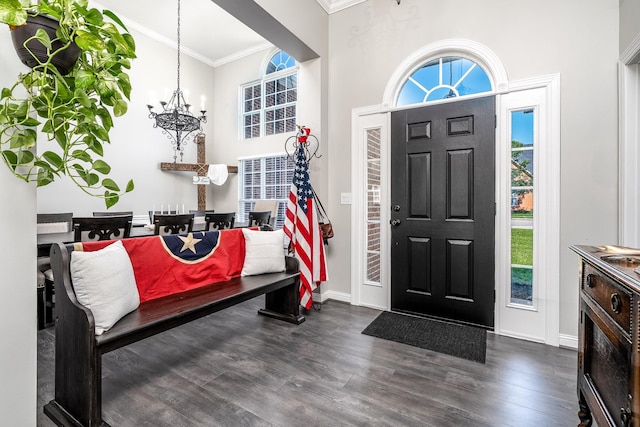 3134 Friars Bridge Pass, Franklin, TN 37064 - foyer entrance with a chandelier, ornamental molding, dark wood-style floors, and a high ceiling