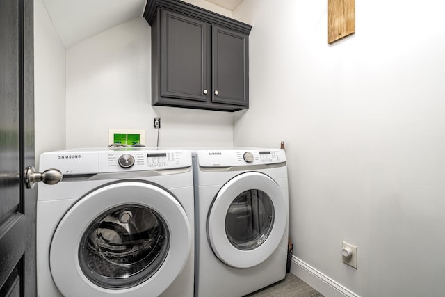 3134 Friars Bridge Pass, Franklin, TN 37064 - laundry room with washing machine and clothes dryer, cabinet space, and wood finished floors