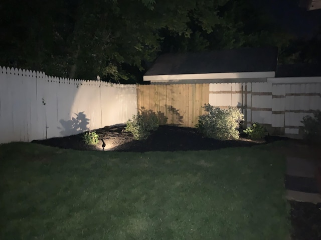 1707 University Dr, Columbia, TN 38401 - yard at twilight with a fenced backyard