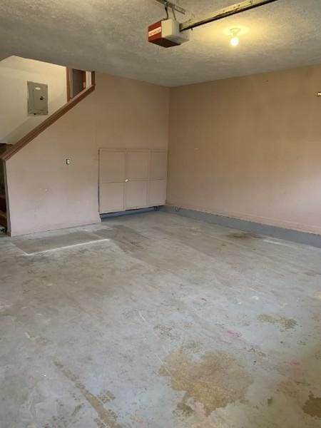 1707 University Dr, Columbia, TN 38401 - garage with a garage door opener and electric panel