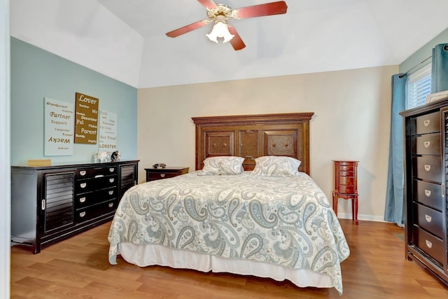 1707 University Dr, Columbia, TN 38401 - bedroom featuring wood finished floors, vaulted ceiling, and ceiling fan