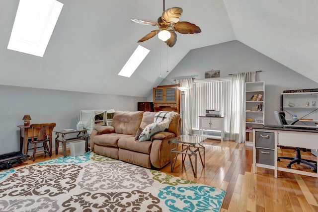 1707 University Dr, Columbia, TN 38401 - living room featuring a skylight, ceiling fan, hardwood / wood-style floors, lofted ceiling, and a desk
