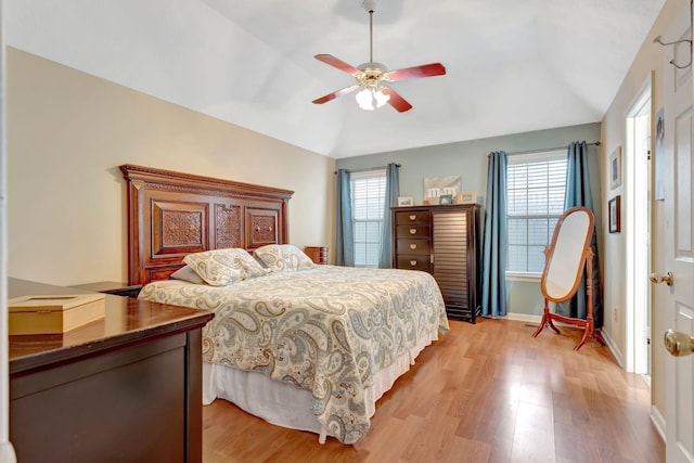 1707 University Dr, Columbia, TN 38401 - bedroom with lofted ceiling, light wood-style flooring, multiple windows, and ceiling fan