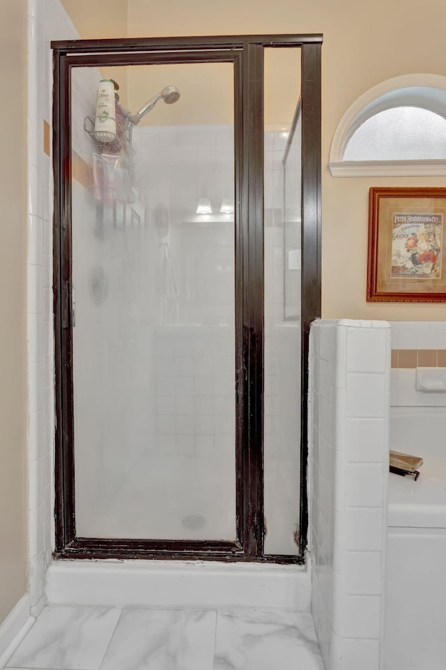 1707 University Dr, Columbia, TN 38401 - bathroom featuring a shower stall and marble finish flooring