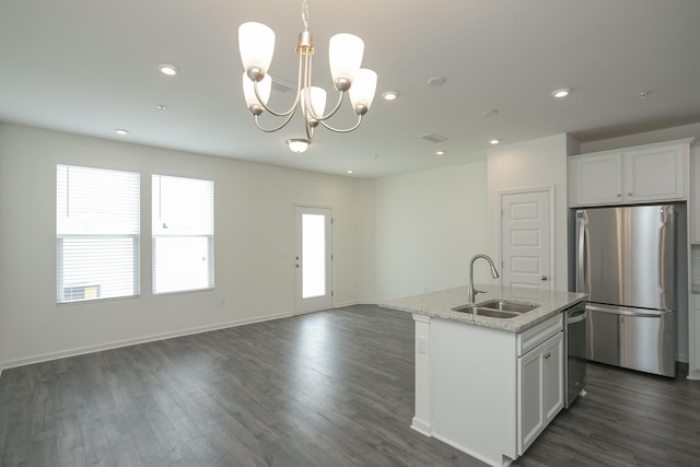 3419 Deerchase Cir, Murfreesboro, TN 37129 - kitchen with stainless steel appliances, dark wood finished floors, a chandelier, hanging light fixtures, and an island with sink