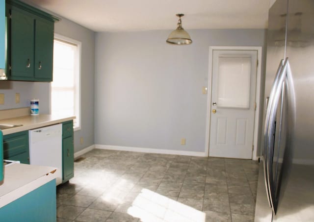 1969 Whirlaway Cir, Clarksville, TN 37042 - kitchen featuring green cabinetry, freestanding refrigerator, white dishwasher, and light countertops