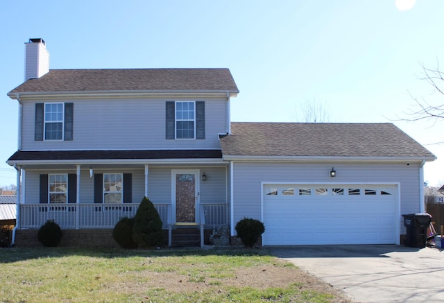1969 Whirlaway Cir, Clarksville, TN 37042 - view of front of home with driveway, a garage, a chimney, a porch, and a front lawn