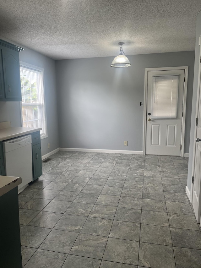1969 Whirlaway Cir, Clarksville, TN 37042 - unfurnished dining area with a textured ceiling and dark tile patterned flooring
