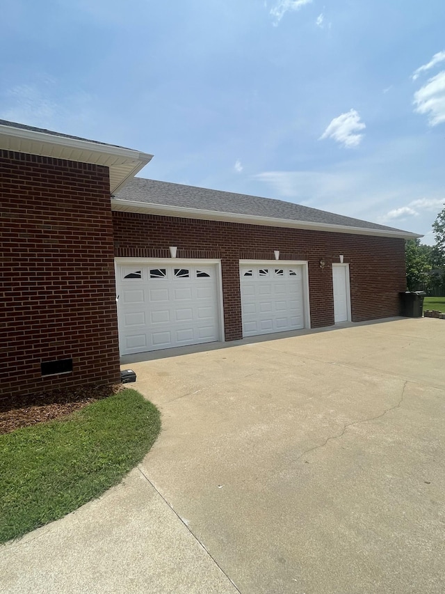 407 Robins St, Lawrenceburg, TN 38464 - garage with concrete driveway