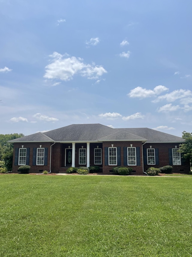 407 Robins St, Lawrenceburg, TN 38464 - single story home with brick siding and a front yard