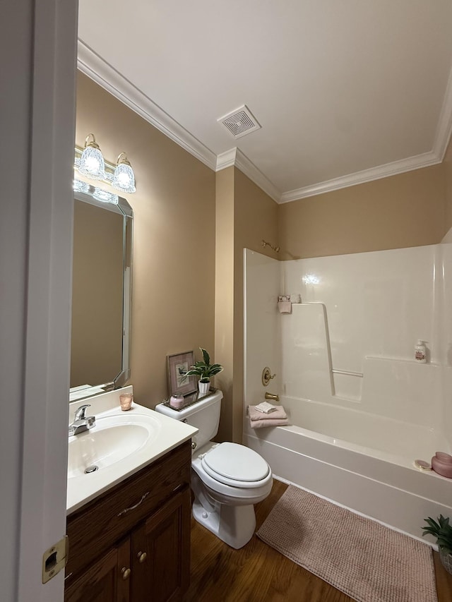 407 Robins St, Lawrenceburg, TN 38464 - full bathroom featuring ornamental molding, wood finished floors, vanity, and shower / bath combination
