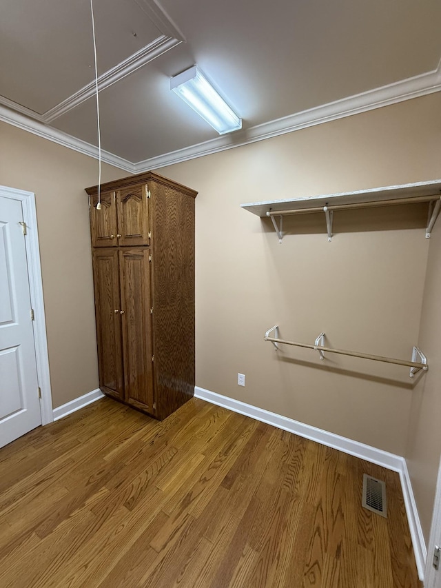 407 Robins St, Lawrenceburg, TN 38464 - walk in closet featuring light wood-style floors