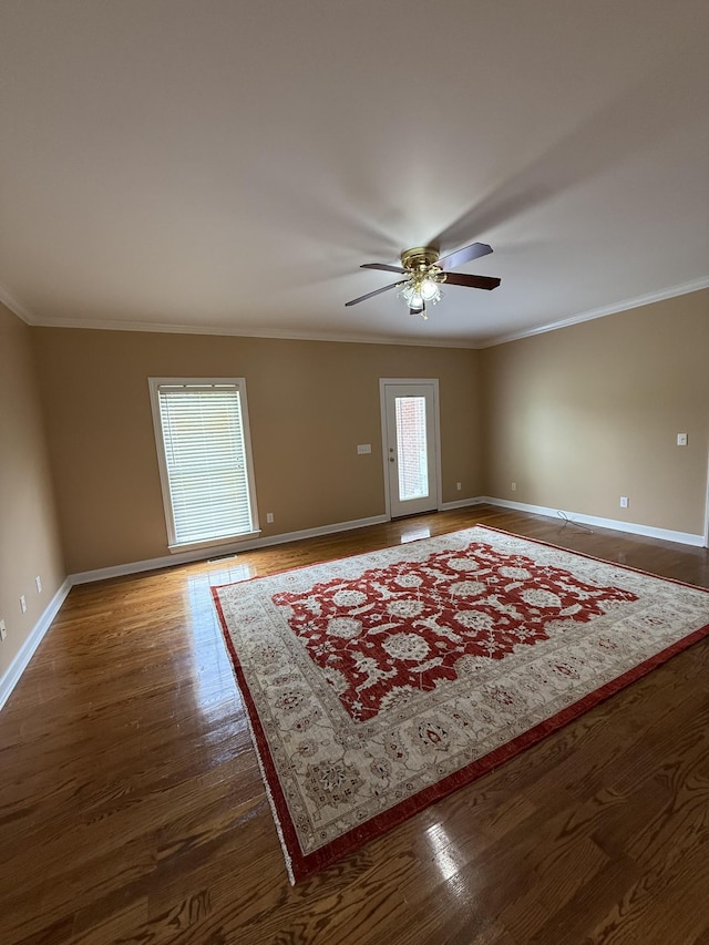 407 Robins St, Lawrenceburg, TN 38464 - spare room featuring ceiling fan, ornamental molding, and wood finished floors