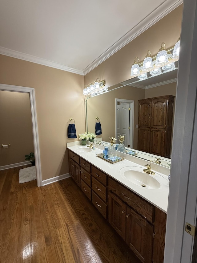407 Robins St, Lawrenceburg, TN 38464 - full bath featuring double vanity, crown molding, and wood finished floors
