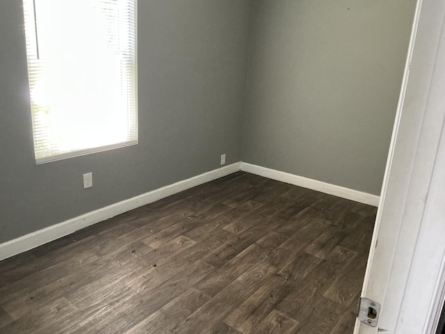 1904 E 31st Street Pl, Chattanooga, TN 37407 - empty room with dark wood-style floors and baseboards