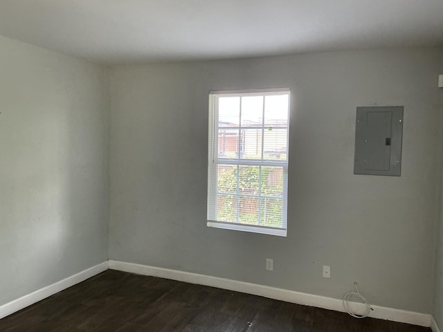 1904 E 31st Street Pl, Chattanooga, TN 37407 - empty room with electric panel and dark wood-type flooring