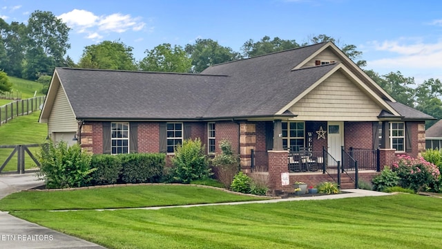8012 Campbells Point Rd, Corryton, TN 37721 - view of front facade featuring brick siding, a porch, concrete driveway, a garage, and roof with shingles