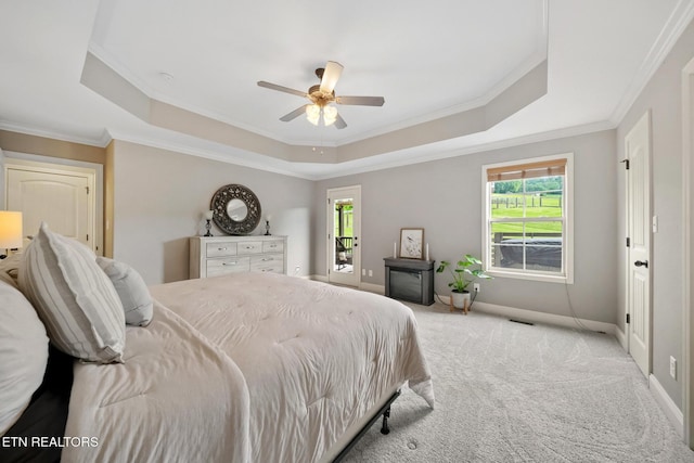 8012 Campbells Point Rd, Corryton, TN 37721 - bedroom with a tray ceiling, crown molding, carpet floors, multiple windows, and ceiling fan