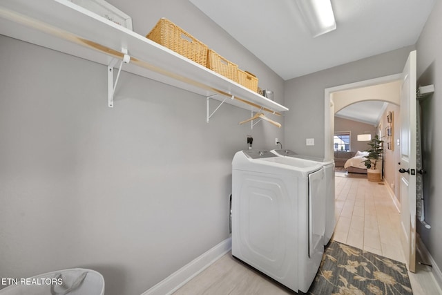 8012 Campbells Point Rd, Corryton, TN 37721 - washroom featuring washing machine and dryer and arched walkways