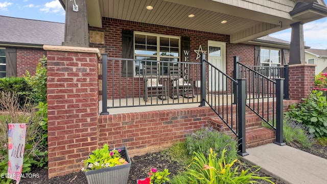 8012 Campbells Point Rd, Corryton, TN 37721 - doorway to property featuring a porch and brick siding