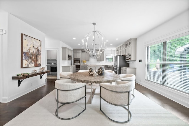 1150 Reda Dr, Clarksville, TN 37042 - dining room with a chandelier, recessed lighting, and dark wood-style floors
