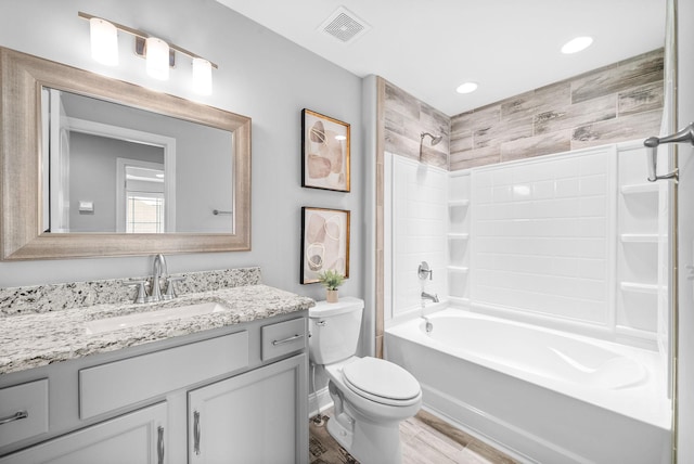 1150 Reda Dr, Clarksville, TN 37042 - full bath with vanity, bathtub / shower combination, wood finished floors, and recessed lighting