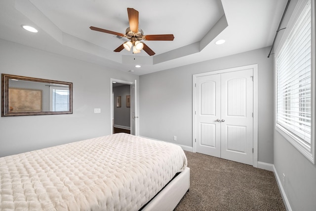 1150 Reda Dr, Clarksville, TN 37042 - carpeted bedroom with a tray ceiling, a closet, recessed lighting, and ceiling fan