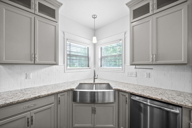 1150 Reda Dr, Clarksville, TN 37042 - kitchen featuring dishwasher, gray cabinetry, backsplash, and glass insert cabinets