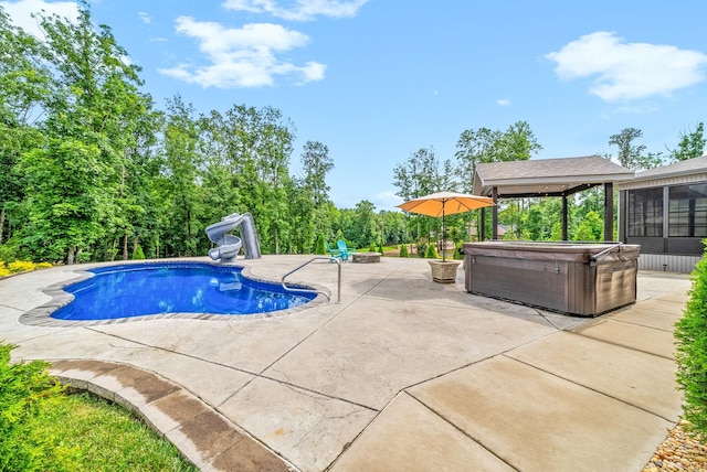 1150 Reda Dr, Clarksville, TN 37042 - outdoor pool with a hot tub, a water slide, a patio, and a gazebo