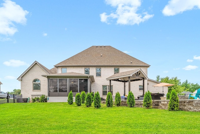 1150 Reda Dr, Clarksville, TN 37042 - back of property with a sunroom, a gazebo, and brick siding