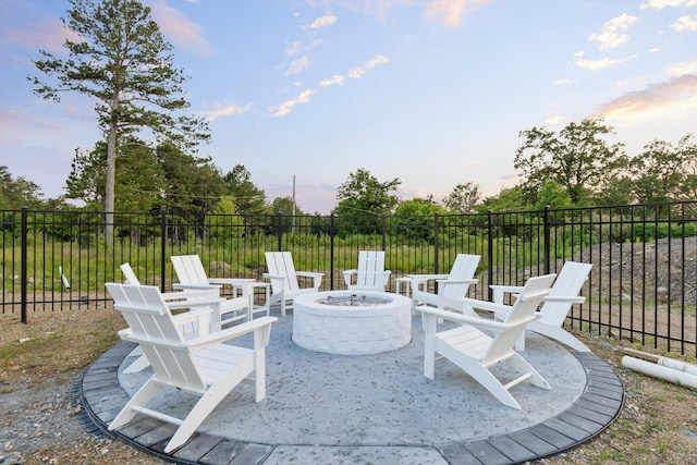 8069 Honeycomb Ln, Chattanooga, TN 37421 - patio terrace at dusk featuring a fire pit