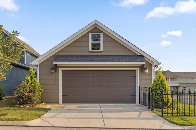 8069 Honeycomb Ln, Chattanooga, TN 37421 - view of front of property featuring a shingled roof and a detached garage