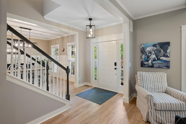 1209 Habersham Way, Franklin, TN 37067 - foyer entrance featuring wood finished floors, stairway, and ornamental molding