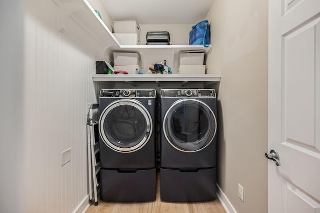 1209 Habersham Way, Franklin, TN 37067 - laundry room with washer and clothes dryer and wood finished floors