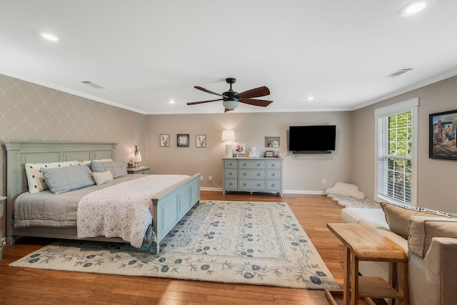 1209 Habersham Way, Franklin, TN 37067 - bedroom with an accent wall, light wood-style flooring, crown molding, recessed lighting, and wallpapered walls