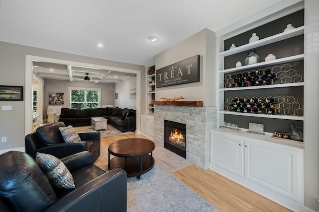 1209 Habersham Way, Franklin, TN 37067 - living area featuring light wood-style flooring, a fireplace, coffered ceiling, ceiling fan, and recessed lighting