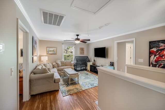 1209 Habersham Way, Franklin, TN 37067 - living room with attic access, wood finished floors, ornamental molding, and ceiling fan