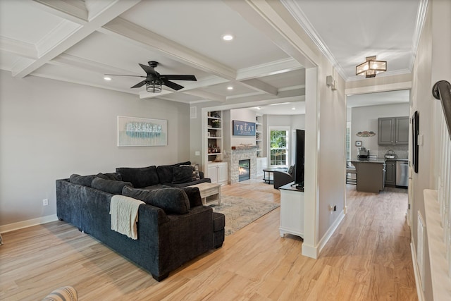 1209 Habersham Way, Franklin, TN 37067 - living room featuring light wood-type flooring, coffered ceiling, beam ceiling, ceiling fan, and a stone fireplace