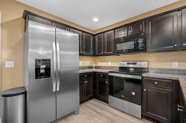 286 Killian Way, Mount Juliet, TN 37122 - kitchen featuring stainless steel appliances, light wood-style flooring, dark brown cabinetry, recessed lighting, and light countertops